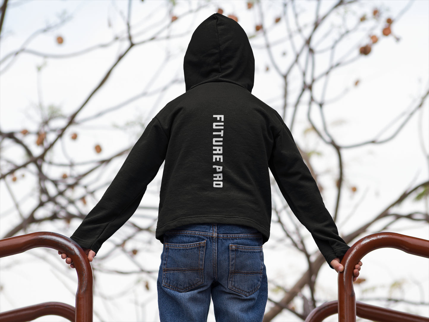 young footballer wearing Future Pro hoodie